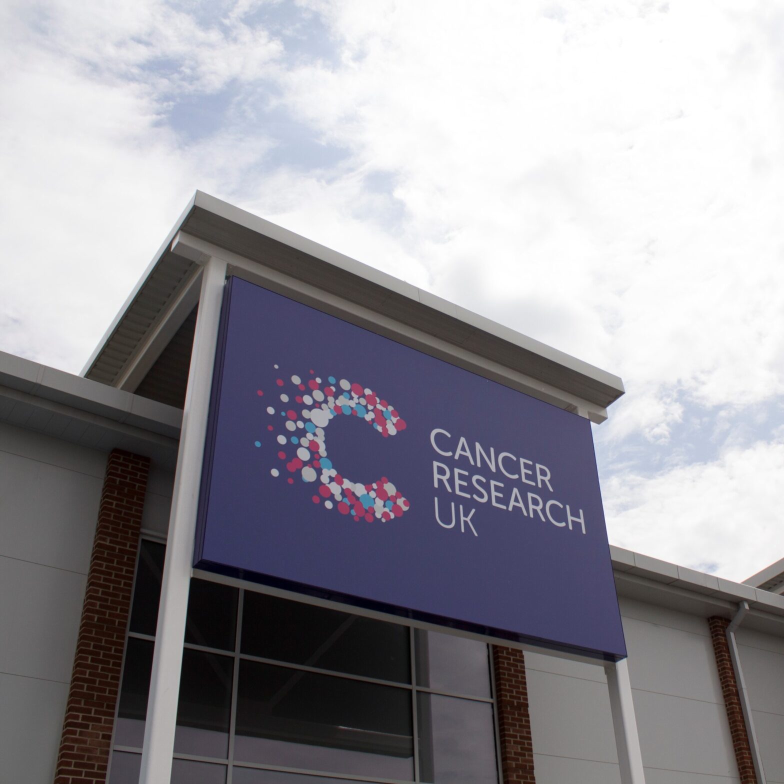 Tamlite Cancer Research building exterior signage