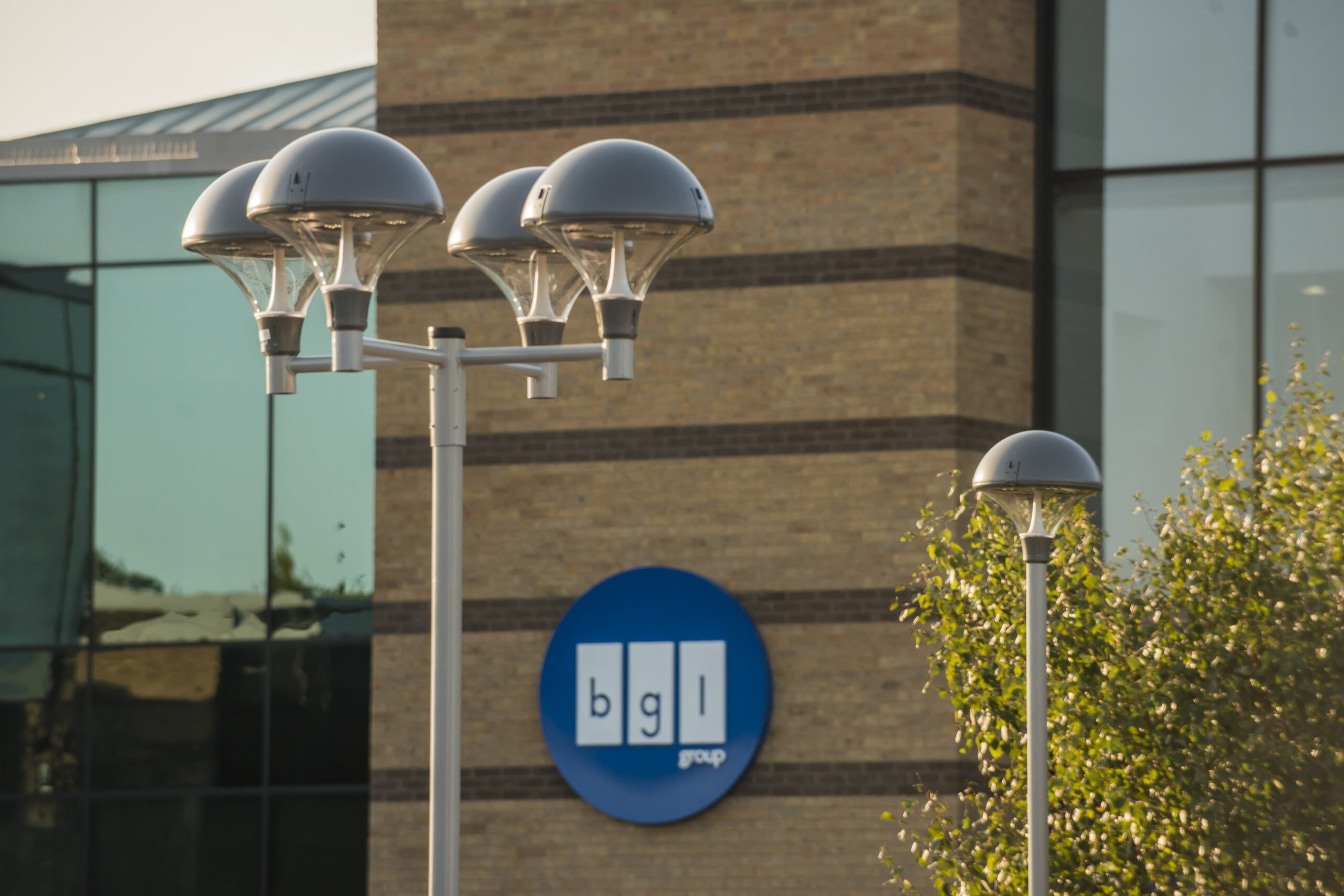 Tamlite BGL Group building exterior with logo PLAZA lighting