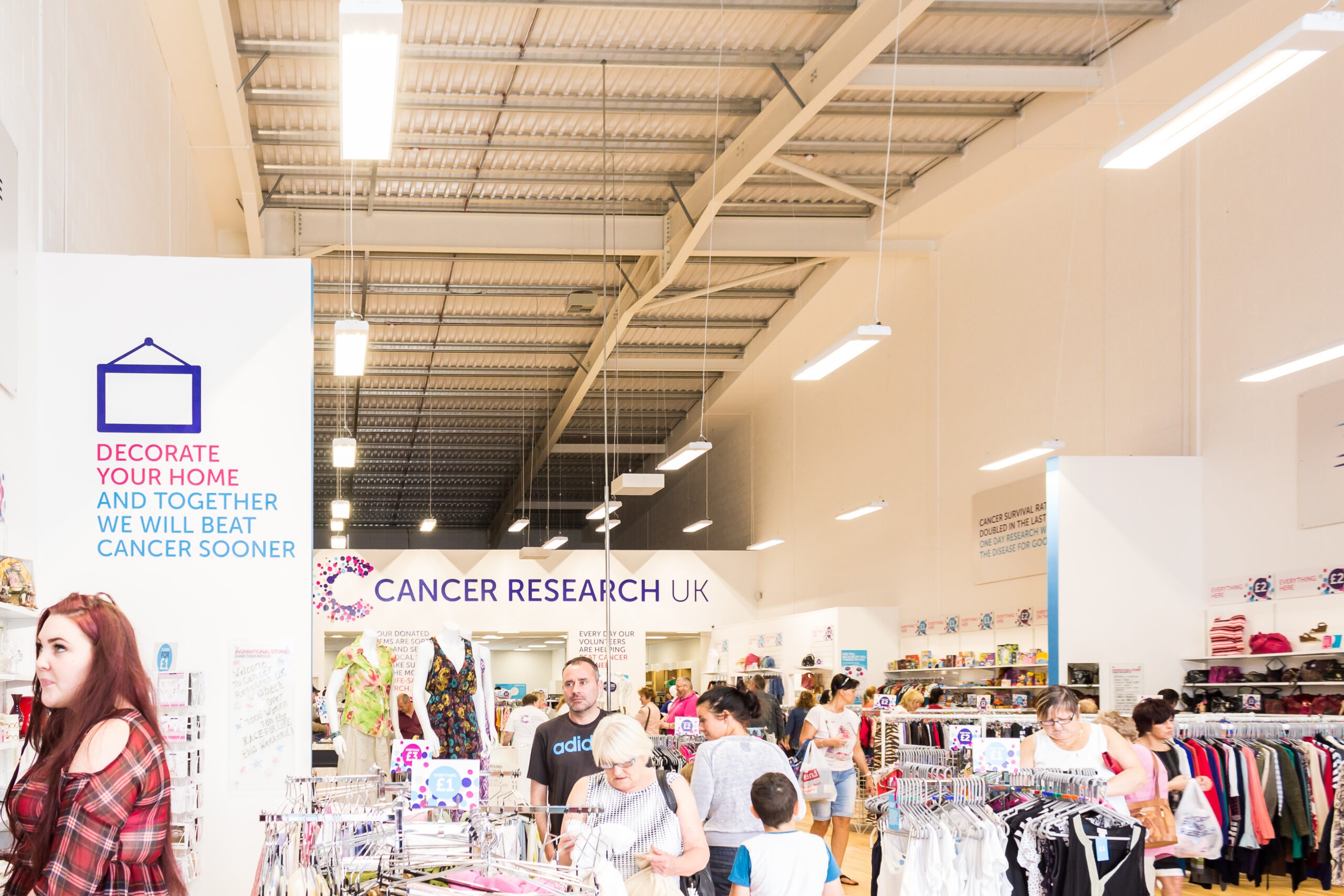 Tamlite Cancer Research retail lights store clothing suspended lighting