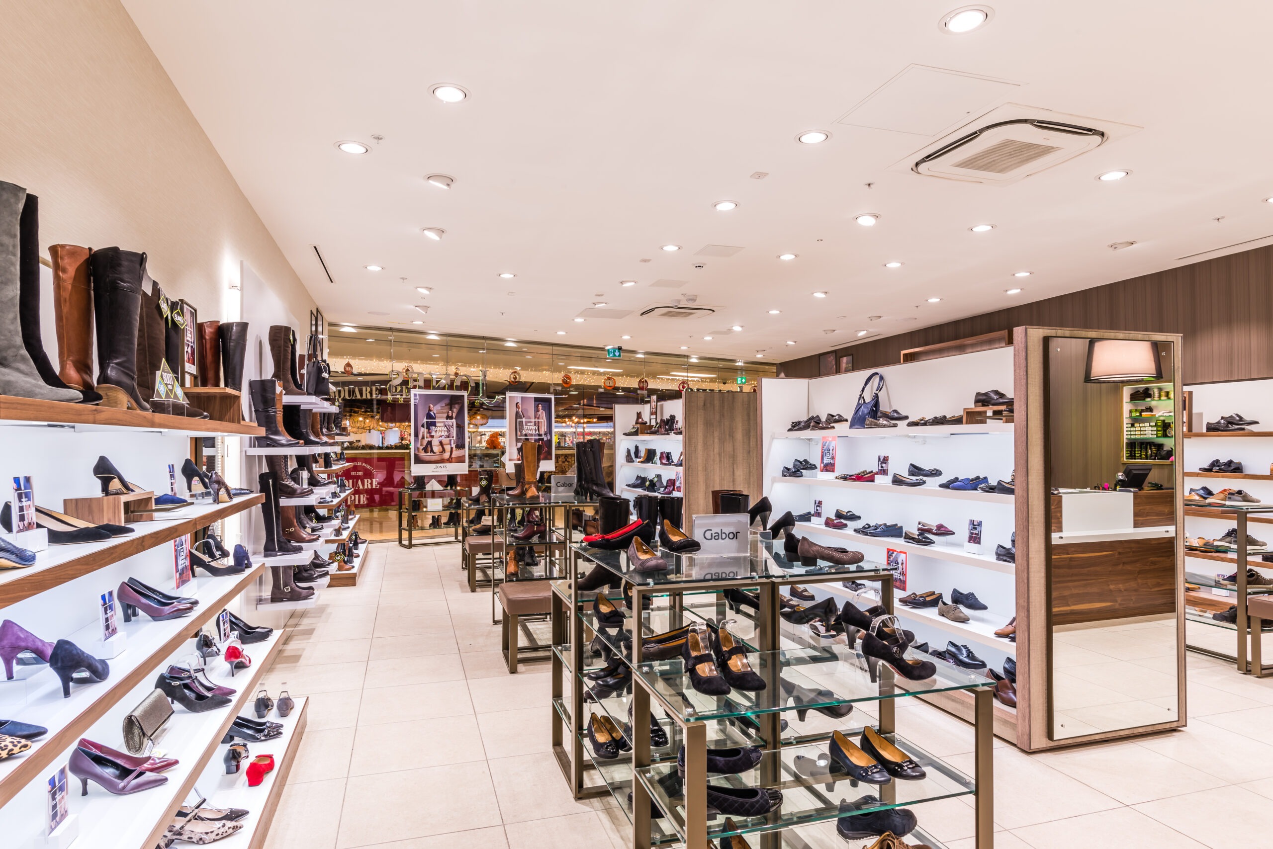 Tamlite Jones Bootmaker retail lighting women's shoe displays
