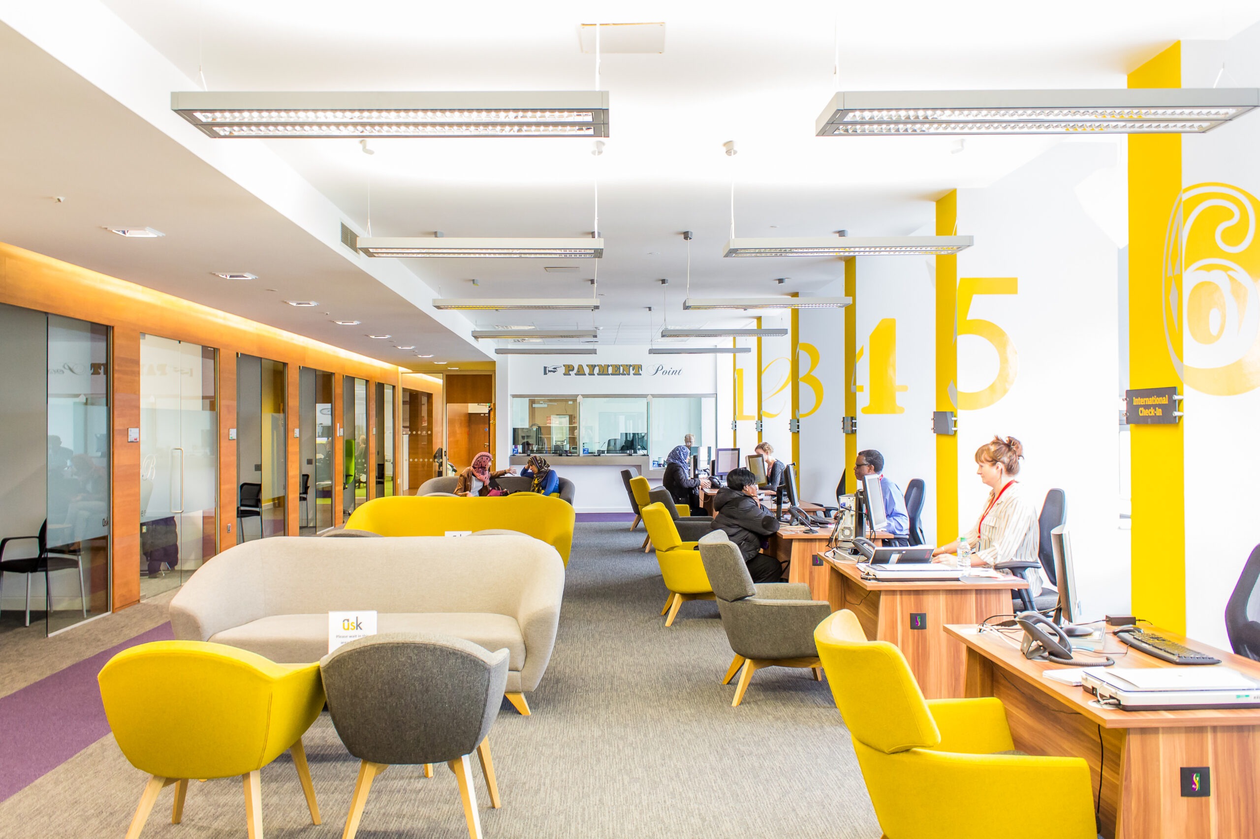 Tamlite University of Salford office lighting yellow white and grey